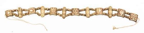 * A String of Tibetan Carved Bone Beads Length 20 inches.