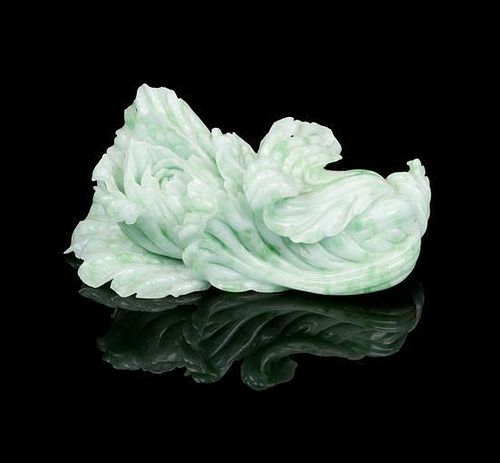 * A Jadeite Carved Cabbage Width 7 5/8 inches.
