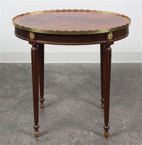 * A Louis XVI Style Gilt Metal Mounted Mahogany Side Table Height 27 inches.