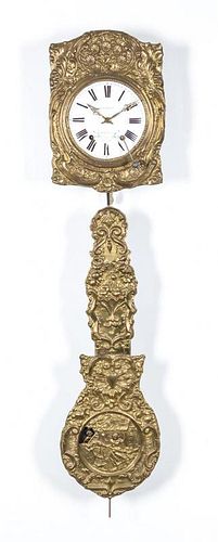 A French Brass Wag-On-The-Wall Clock Length of pendulum 43 1/2 inches.
