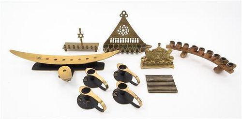 * A Collection of Five Menorahs Width of widest 13 1/4 inches.