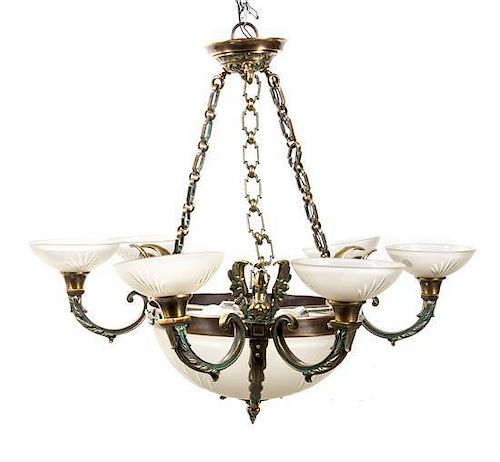 A Neoclassical Brass and Glass Six-Light Chandelier Diameter 38 1/2 inches.