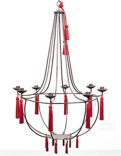 An Empire Style Iron Eight-Light Chandelier Height 32 1/2 x diameter 22 1/2 inches.