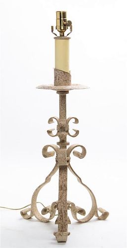 * A Painted Wrought Iron Pricket Stick Height 21 1/2 inches.