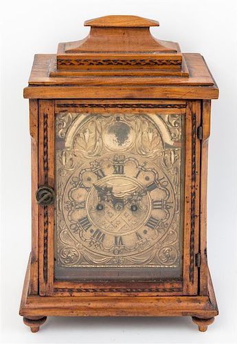 An English Mahogany Bracket Clock Height 14 1/2 inches.