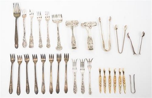 * A Group of Silver-Plate Flatware Servers Length of longest 13 1/2 inches.
