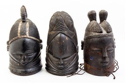 * A Group of Three Helmet Masks Height of tallest 15 1/4 inches.