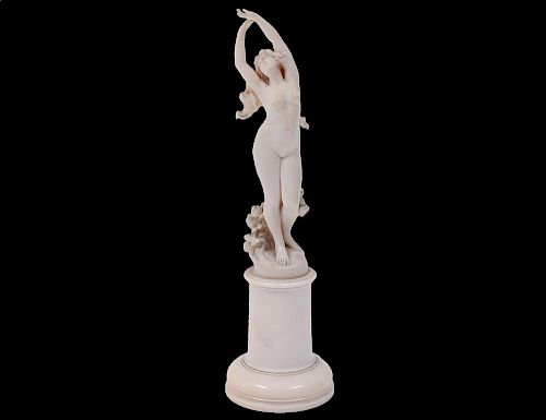 CONTINENTAL CARVED IVORY FIGURE OF A NUDE