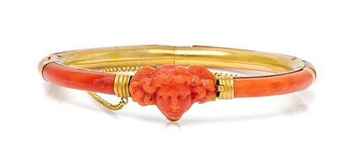 A Victorian Yellow Gold and Coral Bangle Bracelet, 13.40 dwts.