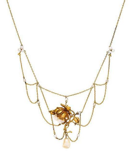 An Art Nouveau Yellow Gold and Pearl Swag Necklace, 5.50 dwts.