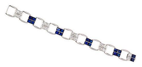 A Platinum, Diamond and Synthetic Sapphire Bracelet, 22.40 dwts.