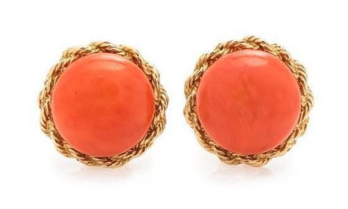 * A Pair of Yellow Gold and Coral Earclips, 8.10 dwts.
