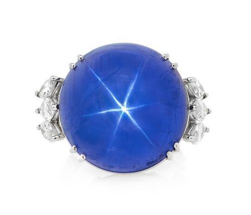 * A Platinum, Burmese Star Sapphire and Diamond Ring, 10.20 dwts.