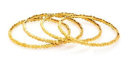 A Collection of 22 Karat Yellow Gold Bangle Bracelets, 34.70 dwts.