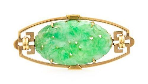 * A Yellow Gold and Jadeite Jade Brooch, 4.30 dwts.