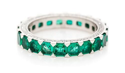 An 18 Karat White Gold, Emerald and Diamond Ice Cube Eternity Band, Chopard, 3.70 dwts.