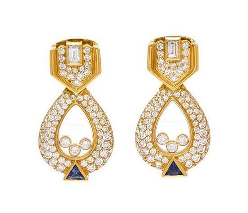 * A Pair of 18 Kart Yellow Gold, Diamond and Sapphire Happy Diamonds Earclips, Chopard, 10.40 dwts.