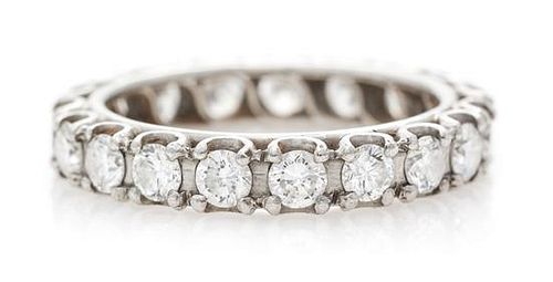 A Platinum and Diamond Eternity Band, 3.20 dwts.
