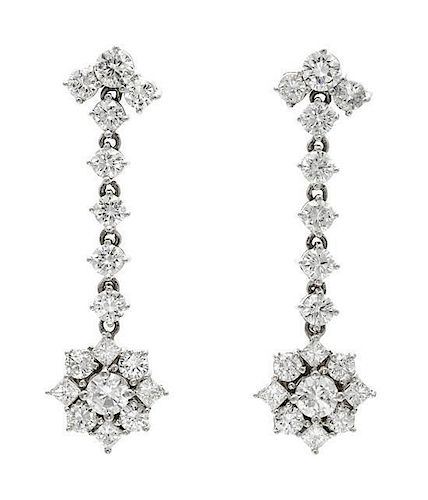 A Pair of White Gold and Diamond Pendant Earrings, 12.10 dwts.