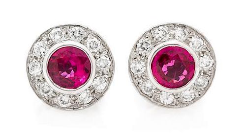 A Pair of 14 Karat White Gold, Ruby and Diamond Stud Earrings, 1.80 dwts.