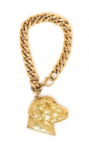 * A Yellow Gold Curb Link Bracelet with Attached 14 Karat Yellow Gold Labrador Show Dog Locket Charm, Circa 1950's, 56.00 dwts.