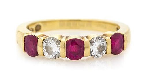 * An 18 Karat Yellow Gold, Ruby and Diamond Band Ring, Tiffany & Co., 2.90 dwts.