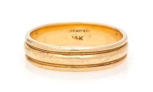 * A 14 Karat Yellow Gold Ring, Tiffany & Co. 3.70 dwts.