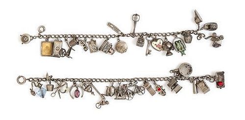 A Pair of Vintage Sterling Silver Charm Bracelet with Numerous Attached Articulated Charms, 36.80 dwts.