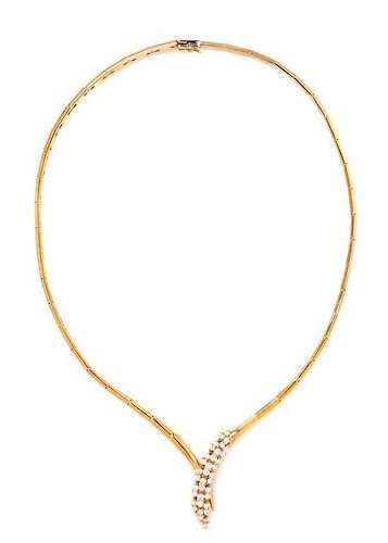A 14 Karat Yellow Gold and Diamond Necklace, 15.70 dwts.