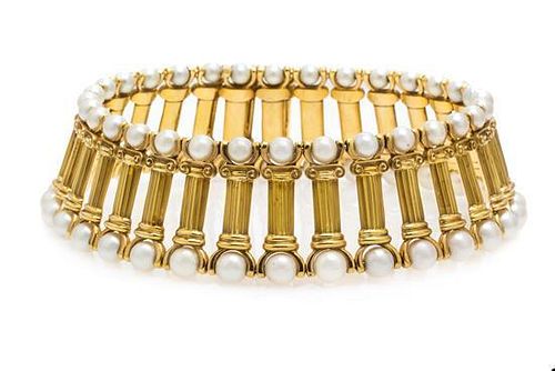 * An 18 Karat Yellow Gold and Cultured Pearl Column Motif Collar Necklace, 121.30 dwts.