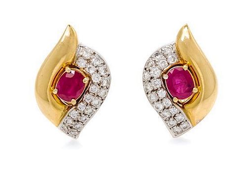 * A Pair of 18 Karat Bicolor Gold, Ruby and Diamond Earclips, Hauer, 10.90 dwts.