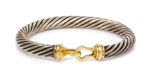 A Sterling Silver and 14 Karat Yellow Gold Cable Classics Bangle Bracelet, David Yurman, 29.30 dwts.