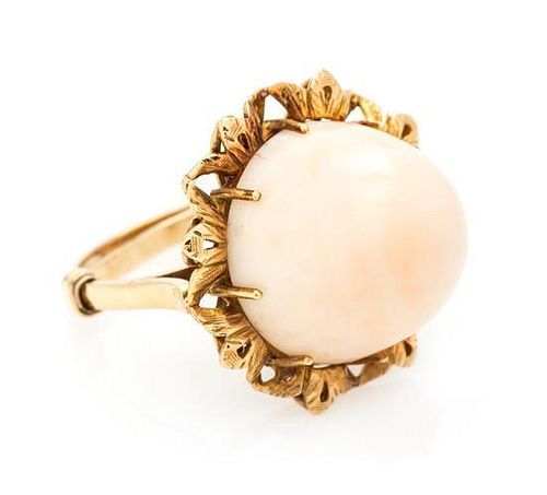 * A Yellow Gold and Coral Ring, 9.20 dwts.