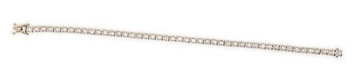 An 18 Karat White Gold and Diamond Line Bracelet, 9.80 dwts.