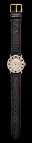 An 18 Karat Bicolor Gold and Sapphire Wristwatch, Audemars Piguet,