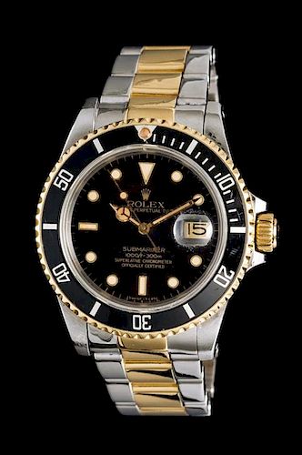 A Stainless Steel and Yellow Gold Ref. 16803 Submariner Wristwatch, Rolex, Circa 1984,