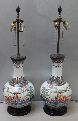 Pair of Asian Porcelain Lamps with Figural Motif.