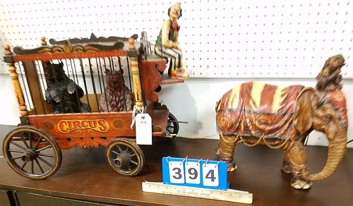 WOODEN AND METAL CIRCUS WAGON 17"H X 22"W X 12"D BY A RESIN ELEPHANT 14 1/2"H X 14"L W/ CLOWN DRIVER & 2 SEATED BEARS 8 1/2"