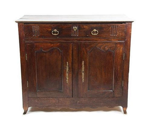 A Louis XV Provincial Oak Cabinet Height 39 x width 44 1/2 x depth 19 1/2 inches.