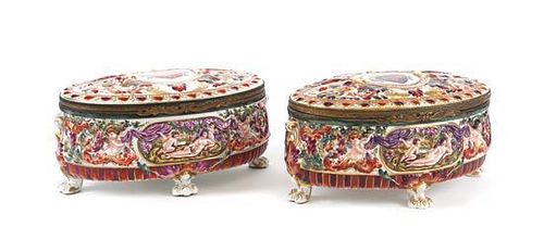 A Pair of Capo-di-Monte Porcelain Oval Boxes Length 10 inches.