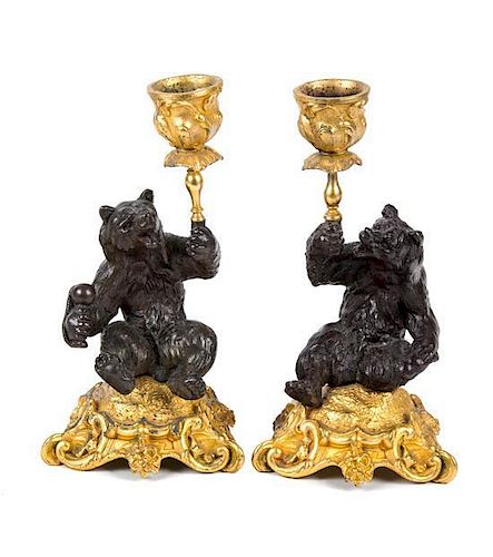 A Pair of Gilt and Patinated Bronze Figural Candlesticks Height 6 1/2 inches.