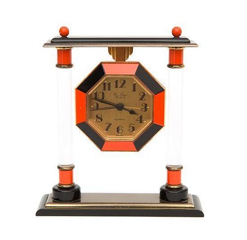 A French Enameled Table Clock Height 5 inches.