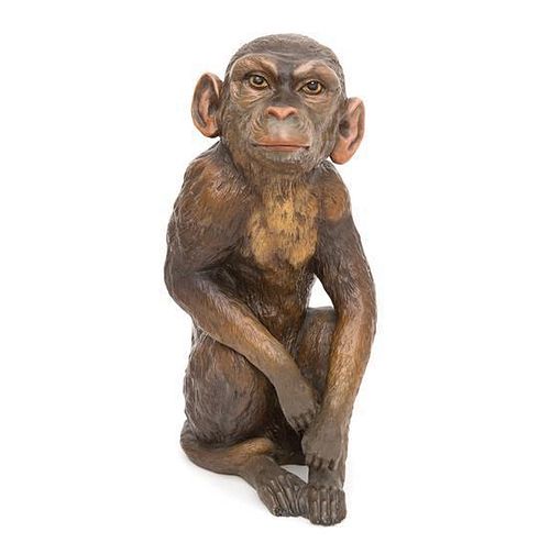 A Continental Painted Ceramic Model of a Seated Monkey Height 15 inches.
