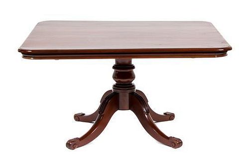 A Georgian Style Mahogany Breakfast Table Height 29 x width 53 3/4 x depth 47 1/2 inches.