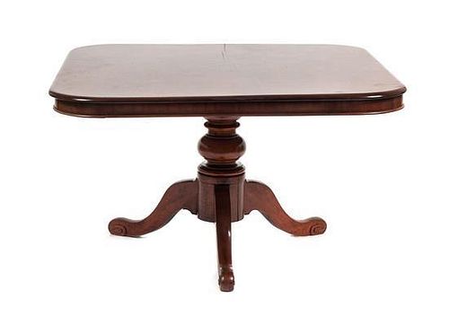 A Georgian Style Mahogany Breakfast Table Height 29 x width 53 x depth 48 1/2 inches.