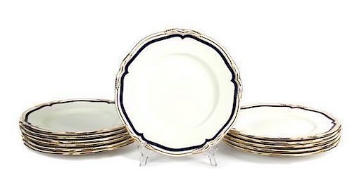 Twelve Mintons Porcelain Dinner Plates Diameter 10 1/2 inches.