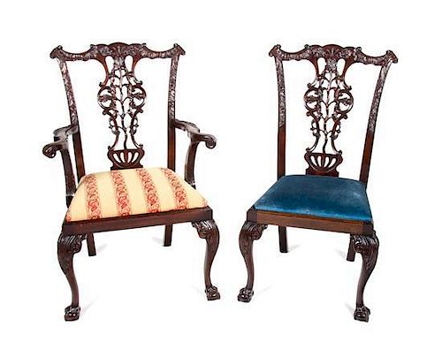 A Set of Twelve Chippendale Style Mahogany Dining Chairs Height 41 inches.