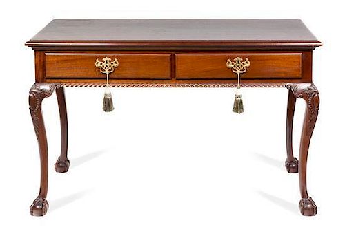A Chippendale Style Mahogany Console Table Height 31 x width 48 x depth 22 1/2 inches.