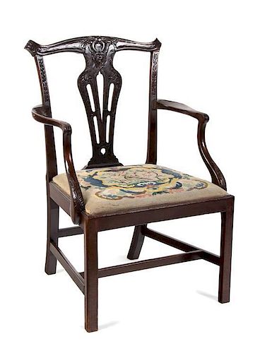 A Chippendale Style Mahogany Armchair Height 37 inches.