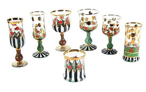 A Collection of MacKenzie Childs Glass Stemware Height of tallest 7 1/2 inches.